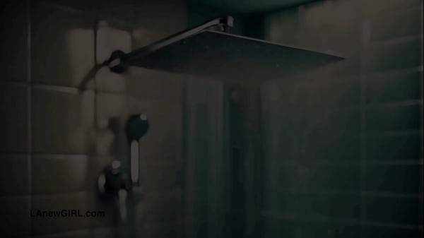 Sexy brunette model enjoys a sensual bath